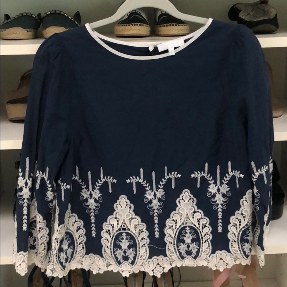 Blue and white embroidered blouse